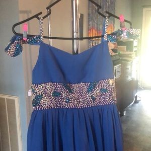 Size 10 Girls One More Couture Blue off shoulder pageant dress.